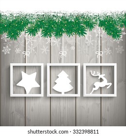 Fir twigs with snow on the wooden background. Eps 10 vector file.