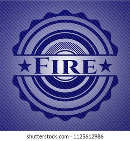 Fire badge with denim background