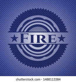 Fire badge with denim texture. Vector Illustration. Detailed.