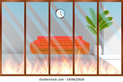The fire is burning in the living room of a house