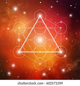 Fire element symbol inside Metatron Cube and Flower of Life in front of space background. Sacred geometry futuristic vector design.