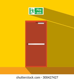 fire exit door on yellow wall