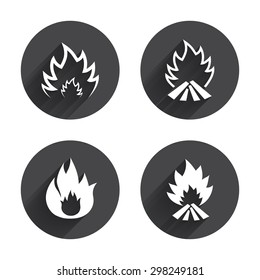Fire flame icons. Heat symbols. Inflammable signs. Circles buttons with long flat shadow. Vector