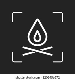 fire flame. simple silhouette. White object in camera autofocus on dark background