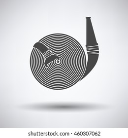 Fire hose icon on gray background with round shadow. Vector illustration.