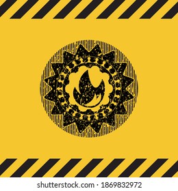 fire icon black grunge emblem inside yellow warning sign. Vector Illustration. Detailed. 