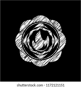 fire icon drawn on a blackboard