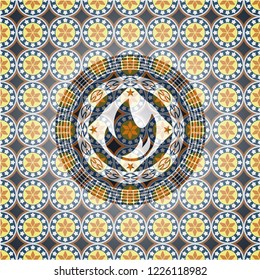 fire icon inside arabesque style emblem. arabic decoration.