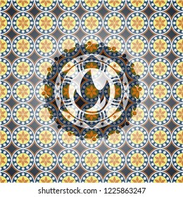 fire icon inside arabic style emblem. Arabesque decoration.