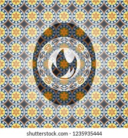 fire icon inside arabic style emblem. Arabesque decoration.