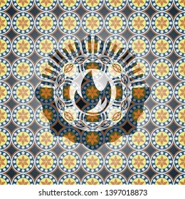 fire icon inside arabic style badge. Arabesque decoration.
