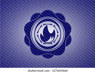 fire icon inside badge with denim texture