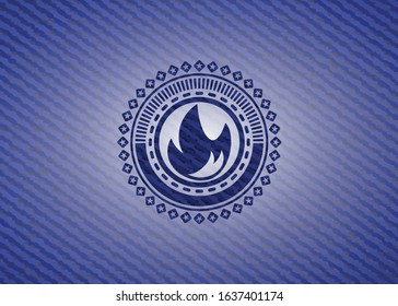 fire icon inside badge with denim texture