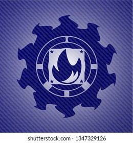 fire icon inside badge with jean texture