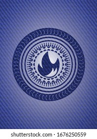 fire icon inside badge with jean texture