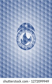 fire icon inside blue hexagon emblem.
