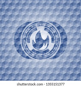 fire icon inside blue polygonal emblem.