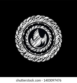 fire icon inside chalkboard emblem