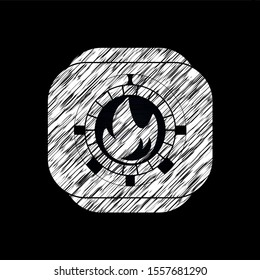 fire icon inside chalkboard emblem