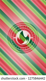fire icon inside christmas colors badge.