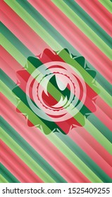 fire icon inside christmas emblem.