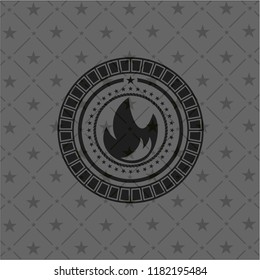 fire icon inside dark badge or emblem