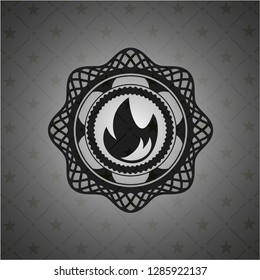 fire icon inside dark emblem