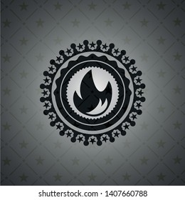fire icon inside dark emblem