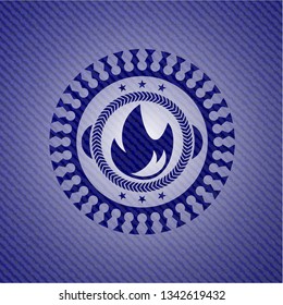 fire icon inside denim background