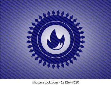 fire icon inside emblem with jean high quality background