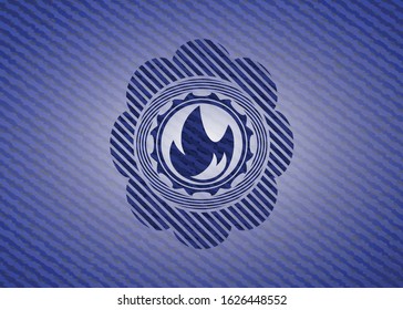 fire icon inside emblem with jean texture