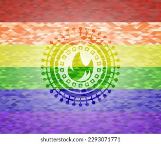 fire icon inside emblem on mosaic background with the colors of the LGBT flag. 
