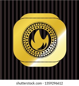 fire icon inside gold emblem