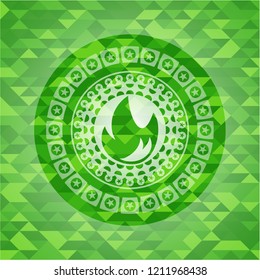 fire icon inside green emblem with mosaic ecological style background
