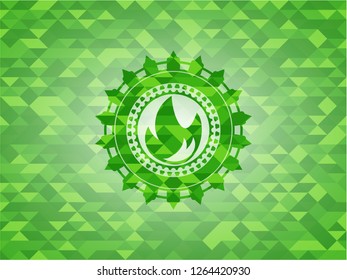 fire icon inside green emblem. Mosaic background