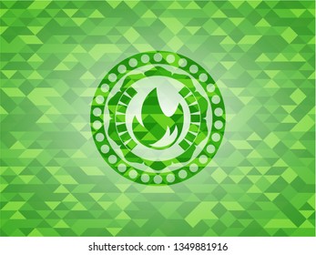 fire icon inside green emblem with mosaic background