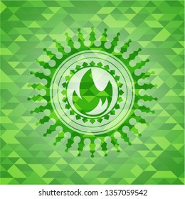 fire icon inside green emblem with mosaic ecological style background