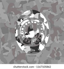 fire icon inside grey camouflage texture