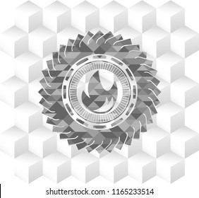 fire icon inside grey emblem with cube white background