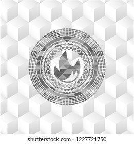 fire icon inside grey icon or emblem with geometric cube white background