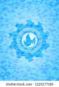 fire icon inside light blue emblem with triangle mosaic background