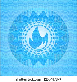 fire icon inside light blue water wave style badge.