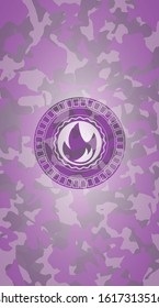 fire icon inside pink camouflaged emblem
