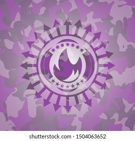 fire icon inside pink and purple camouflage texture