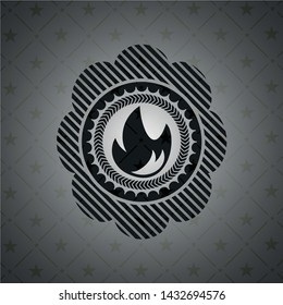 fire icon inside realistic black emblem