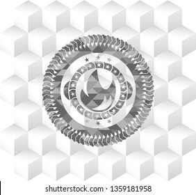 fire icon inside realistic grey emblem with geometric cube white background