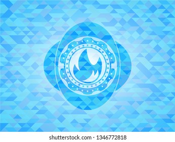 fire icon inside realistic light blue emblem. Mosaic background
