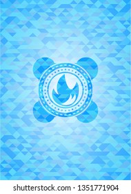 fire icon inside realistic light blue emblem. Mosaic background