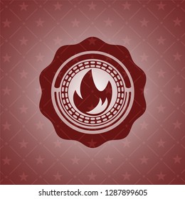 fire icon inside red emblem