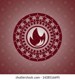 fire icon inside red emblem